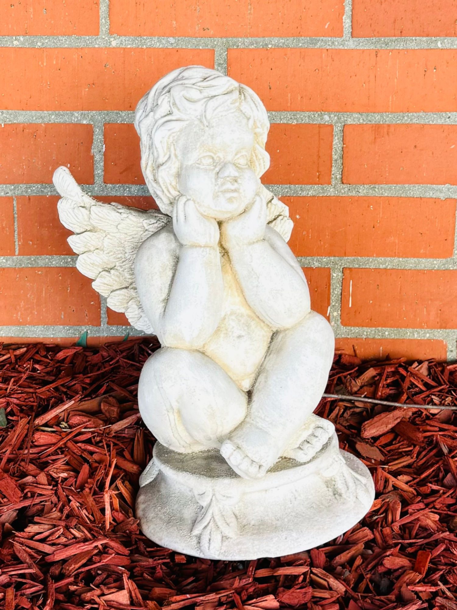 Buca di Beppo Concrete Cherub