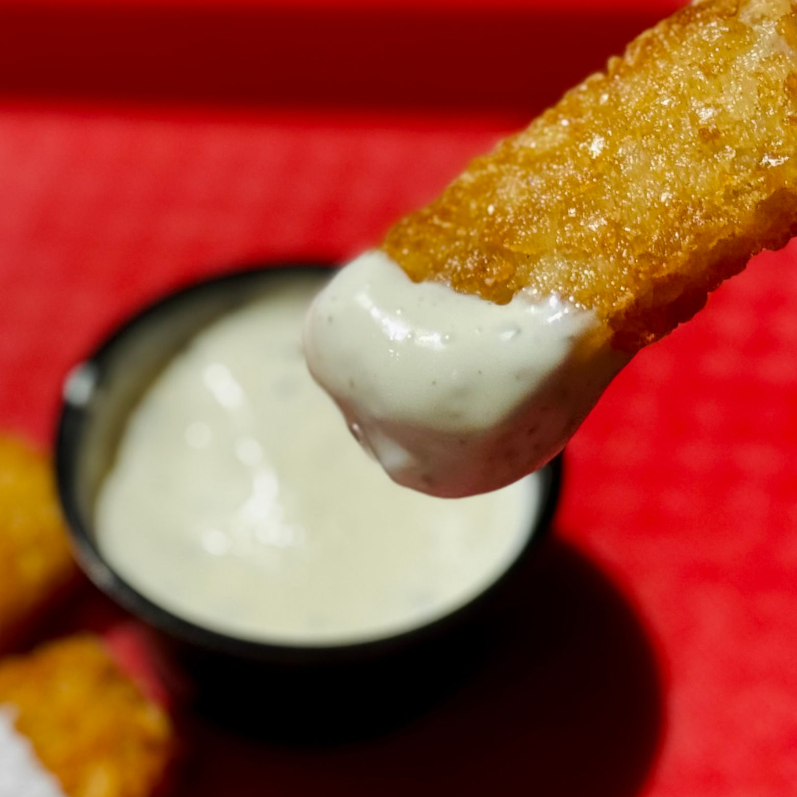 Dip Hashbrown in Ranch Del Taco Ranch Hashbrown